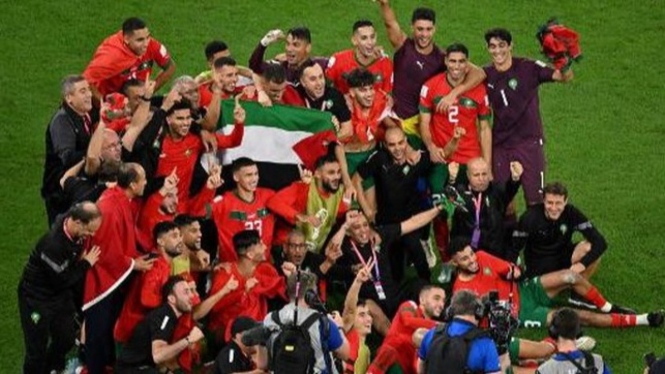 Para pemain Maroko saat merayakan kemenangan Piala Dunia Qatar 2022